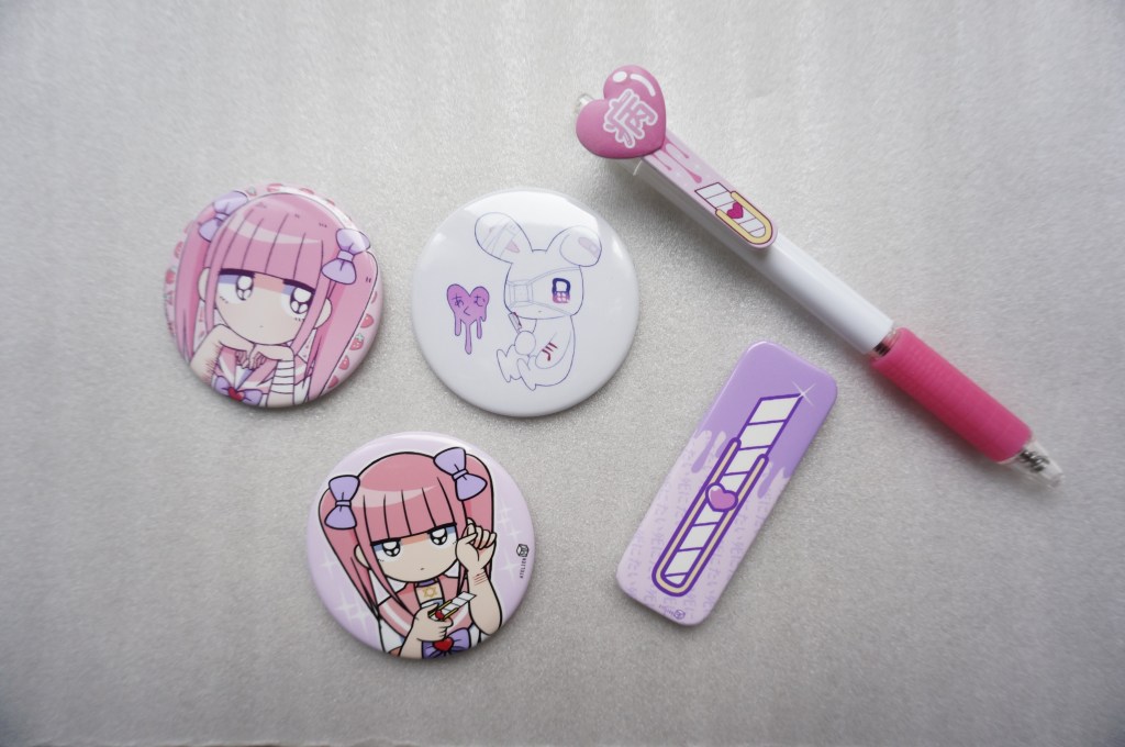 Japanese Yami Kawaii pins and merch by Bisuko Ezaki